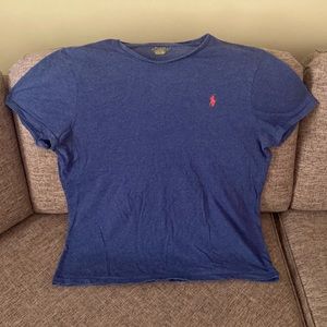 Blue Polo T-shirt with red symbol on chest